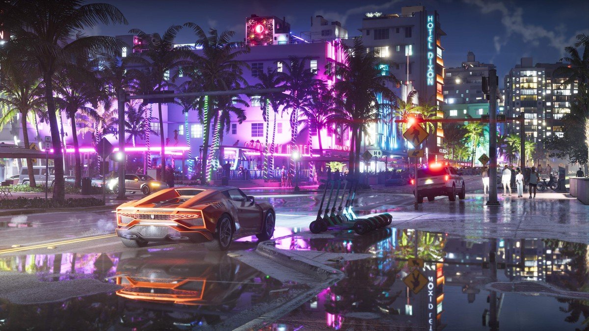 Voiture orange et reflets des néons dans une rue mouillée de Vice City dans GTA VI