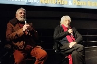 Marco Pico et Pierre Richard assis avec des micros au cinéma Le Champo en novembre 2024